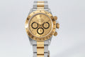 Two-tone gold and silver Rolex watch on a white background