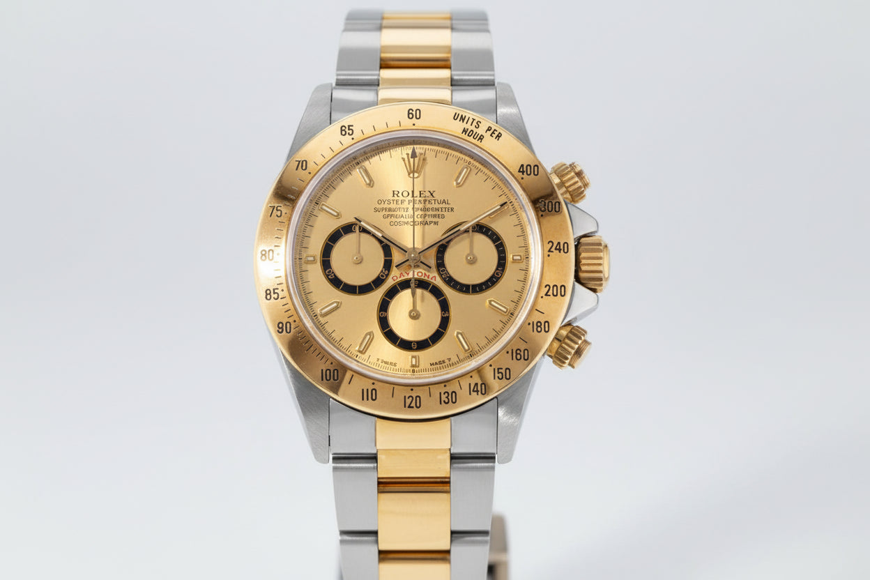 Two-tone gold and silver Rolex watch on a white background