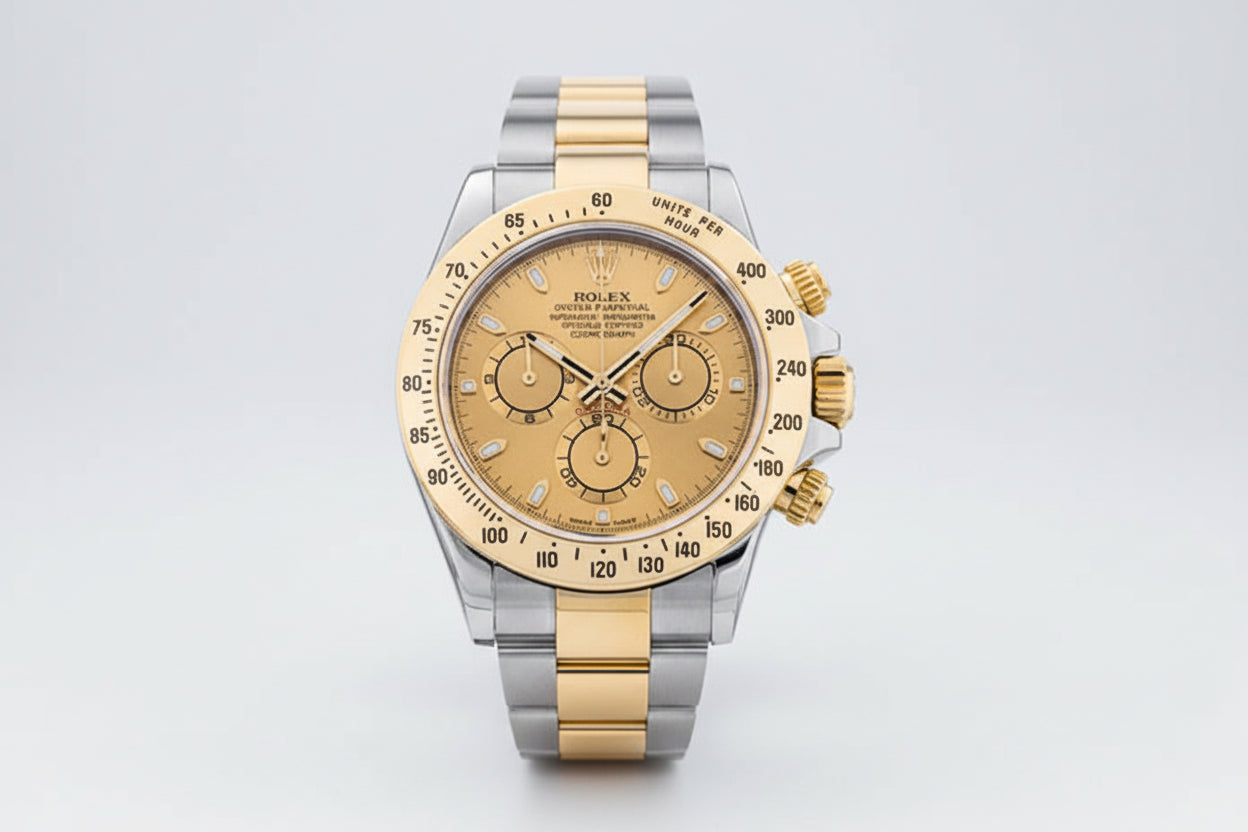 Two-tone gold and silver watch with a detailed face on a white background
